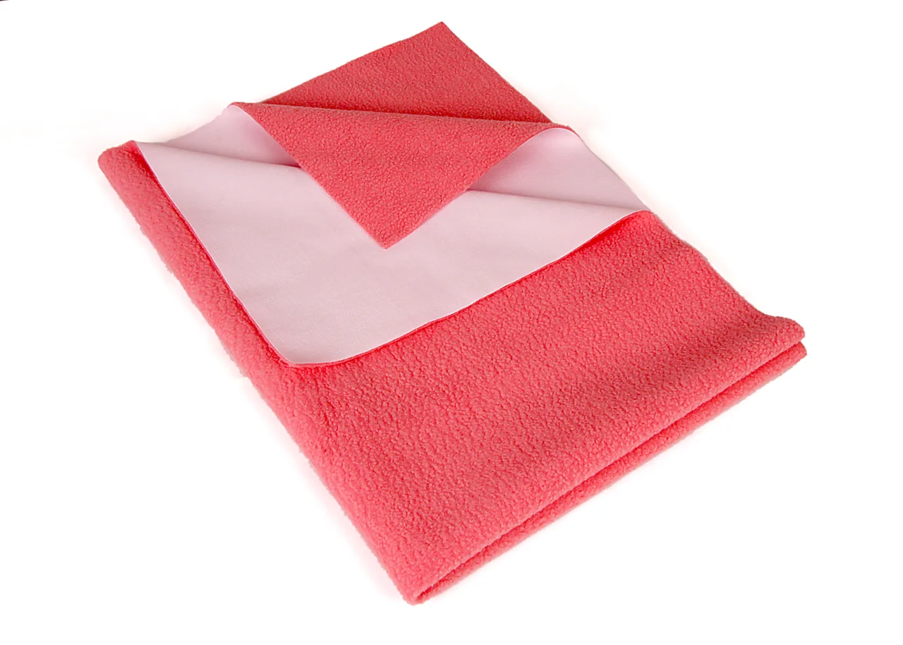 Coral folded textile with a white reverse surface