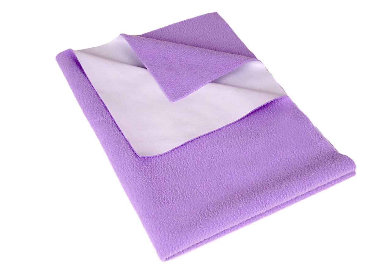 Lilac folded textile with a white reverse surface