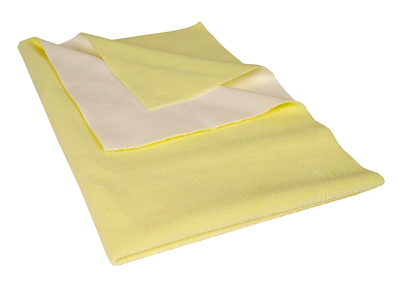 Yellow folded textile with a white reverse surface